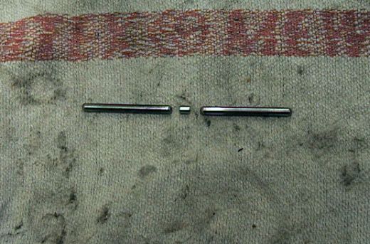 Druckstangen und Stahlrolle